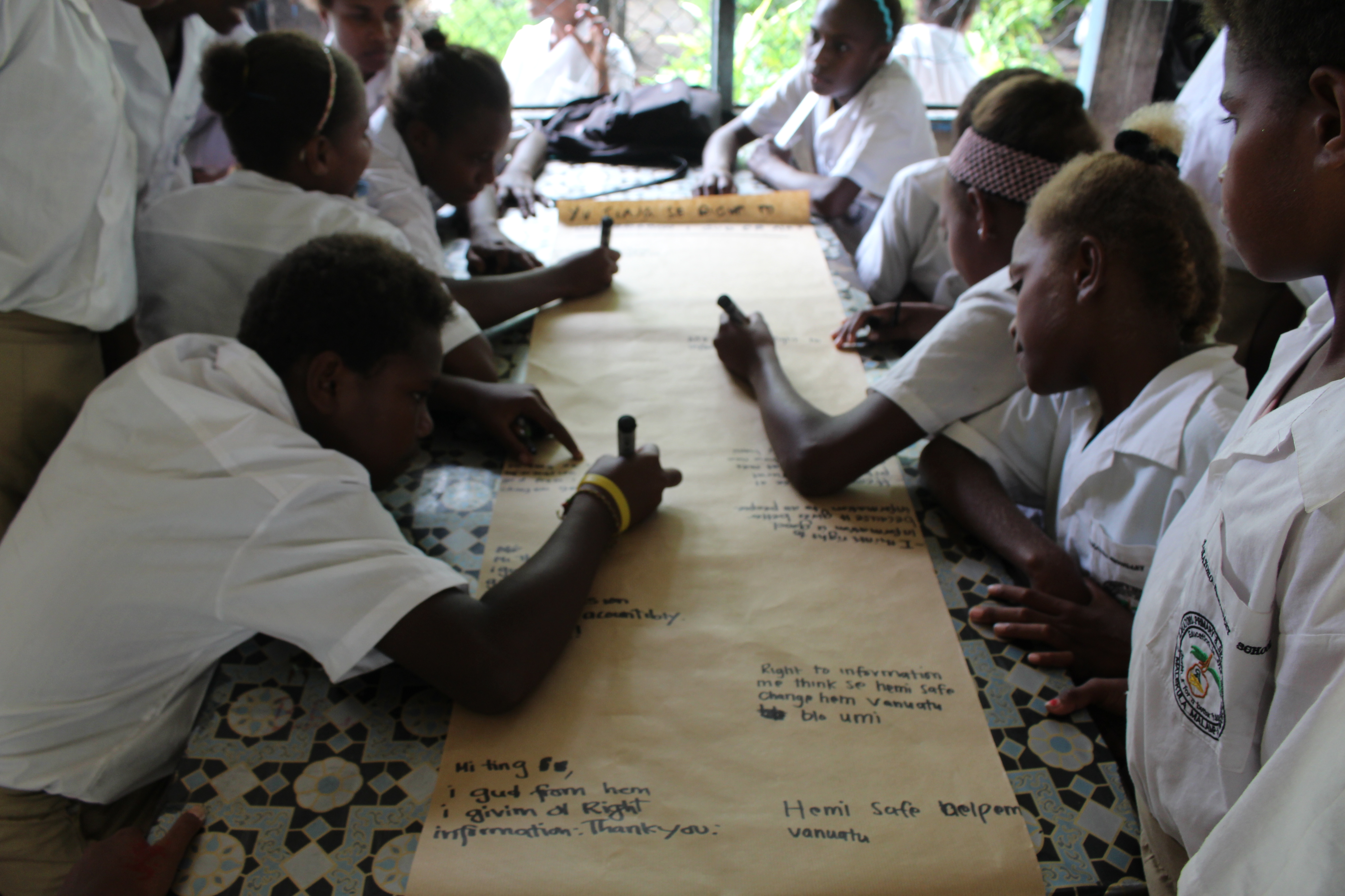 Students participating in a civic education workshop